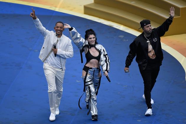US singer Will Smith (L), Kosovo's singer Era Istrefi (C) and US rapper Nick Rivera Caminero aka Nicky Jam (R) perform during the closing ceremony prior to the Russia 2018 World Cup final football match between France and Croatia. (AFP)