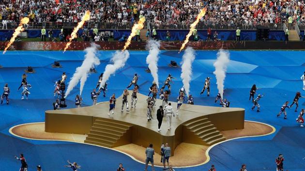 US singer Will Smith (R), Kosovo's singer Era Istrefi (L) and US rapper Nick Rivera Caminero aka Nicky Jam (C) perform during the closing ceremony prior to the Russia 2018 World Cup final football match. (AFP)
