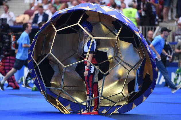 Volunteers prepare for the closing ceremony of the Russia 2018 World Cup ahead of the final football match between France and Croatia at the Luzhniki Stadium. (AFP)