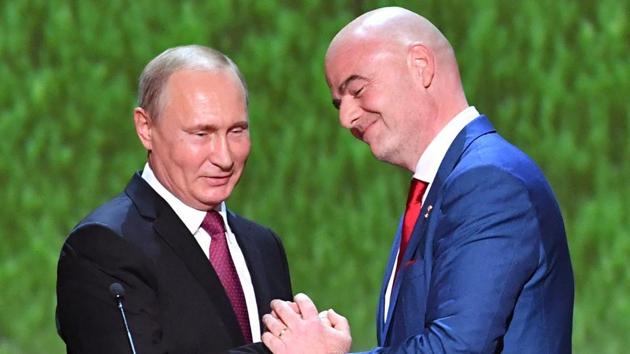 Vladimir Putin (L) shakes hands with FIFA president Gianni Infantino before a gala concert of world opera stars at Bolshoi Theatre ahead of the FIFA World Cup 2018 final between France and Croatia in Moscow. (AFP) Vladimir Putin (L) shakes hands with FIFA president Gianni Infantino before a gala concert of world opera stars at Bolshoi Theatre ahead of the FIFA World Cup 2018 final between France and Croatia in Moscow. (AFP)