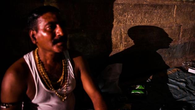 Bahadur Choudhary, 48, a fourth-generation caretaker of Varanasi's ancient cremation grounds. Choudhary is illiterate, poor and low caste, but his role in Varanasi, one of the holiest cities in India, is sacrosanct in Hindu mythology. “The dead are our only business,” said Choudhary. Choudhury and his community survive on whatever the mourners pay them. (Chandan Khanna / AFP) Bahadur Choudhary, 48, a fourth-generation caretaker of Varanasi's ancient cremation grounds. Choudhary is illiterate, poor and low caste, but his role in Varanasi, one of the holiest cities in India, is sacrosanct in Hindu mythology. “The dead are our only business,” said Choudhary. Choudhury and his community survive on whatever the mourners pay them. (Chandan Khanna / AFP)