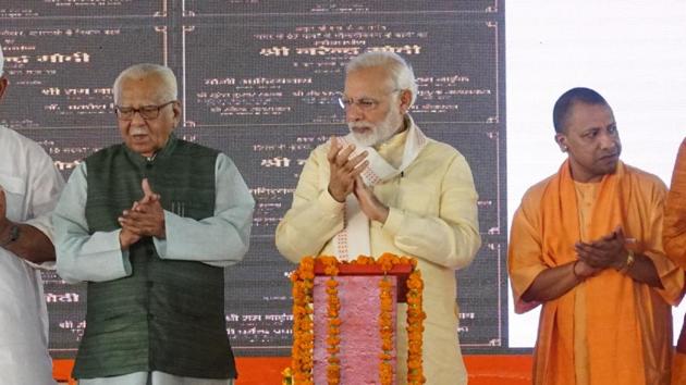 Prime Minister Narendra Modi (centre) with Uttar Pradesh governor Ram Naik (left) and chief minister Yogi Adityanath during a public rally at Rajatalab, Kachnar area, in Varanasi, on July 14, 2018. (Rajesh Kumar/HT Photo) Prime Minister Narendra Modi (centre) with Uttar Pradesh governor Ram Naik (left) and chief minister Yogi Adityanath during a public rally at Rajatalab, Kachnar area, in Varanasi, on July 14, 2018. (Rajesh Kumar/HT Photo)