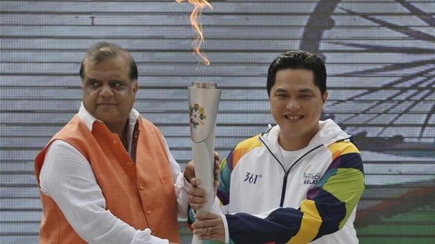 Indian Olympic Association (IOA) President Narinder Batra with Chairman Indonesia Asian Games Organizing Committee (INASGOC) Erick Thohir hold the torch during the 18th Asian Games Jakarta-Palembang 2018 Flame - Lighting Ceremony at Major Dhyanchand National Stadium in New Delhi.(HT PHOTO)