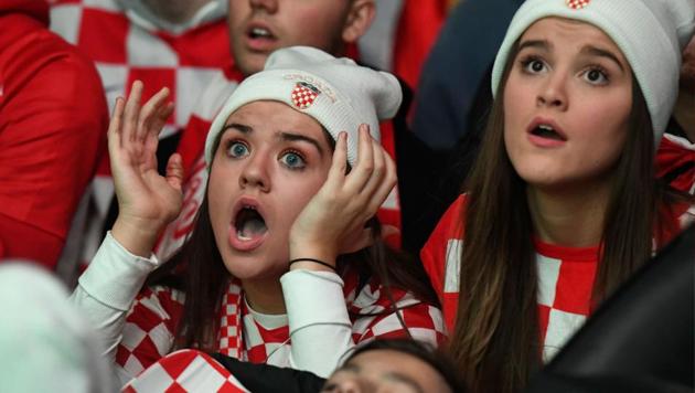A Croatian fan reacts as France scores a goal while they watch the World Cup final in Melbourne. (AFP)
