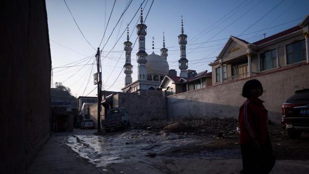 Parents were told the ban on extracurricular Quranic study was for their children’s own good, so they could rest and focus on secular coursework. “We’re scared, very scared. If it goes on like this, after a generation or two, our traditions will be gone,” said Ma Lan, a 45-year-old caretaker. Her son dreams of being an imam, but his schoolteachers have encouraged him to make money and become a Communist cadre. (Johannes Eisele / AFP) Parents were told the ban on extracurricular Quranic study was for their children’s own good, so they could rest and focus on secular coursework. “We’re scared, very scared. If it goes on like this, after a generation or two, our traditions will be gone,” said Ma Lan, a 45-year-old caretaker. Her son dreams of being an imam, but his schoolteachers have encouraged him to make money and become a Communist cadre. (Johannes Eisele / AFP)