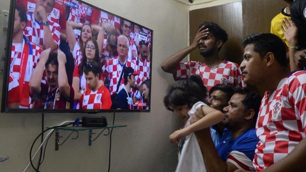 Indian football fans of Croatia react as they watch the Russia 2018 World Cup final match between France and Croatia in Allahabad. (AFP) 