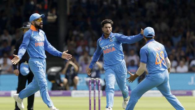 London: India's Kuldeep Yadav, center, celebrates taking the wicket of England's Jonny Bairstow with India captain Virat Kohli, left, during the one day cricket match between England and India at Lord's cricket ground in London. (AP) London: India's Kuldeep Yadav, center, celebrates taking the wicket of England's Jonny Bairstow with India captain Virat Kohli, left, during the one day cricket match between England and India at Lord's cricket ground in London. (AP)