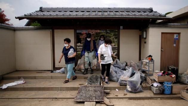 Two years ago, Kurashiki City drafted its own colourful hazard maps, marking all the risky areas. But there were two problems: the city assumed a pattern of prolonged rain over a wide area rather than an intense concentrated downpour as actually occurred, according to online planning documents, and residents say they paid little attention to the maps. (Issei Kato / REUTERS) 