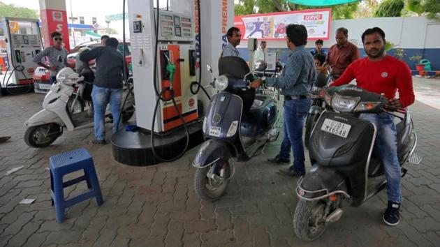 People get their two-wheelers filled with petrol at a fuel station in Ahmedabad.(Reuters File photo) People get their two-wheelers filled with petrol at a fuel station in Ahmedabad.(Reuters File photo)
