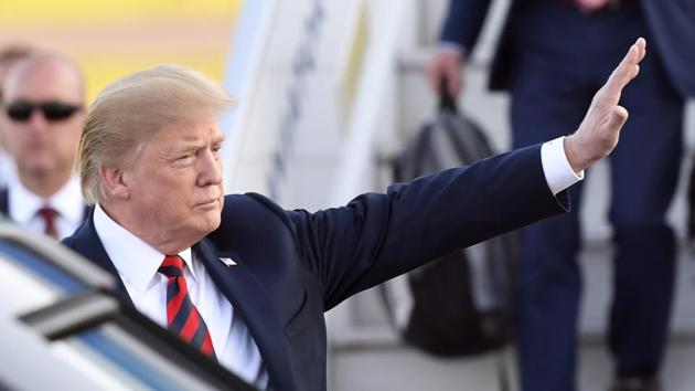 US President Donald Trump waves upon arrival at Helsinki-Vantaa Airport in Helsinki, on July 15, 2018 on the eve of a summit in Helsinki between the US President and Russian president Vladimir Putin. (AFP) US President Donald Trump waves upon arrival at Helsinki-Vantaa Airport in Helsinki, on July 15, 2018 on the eve of a summit in Helsinki between the US President and Russian president Vladimir Putin. (AFP)