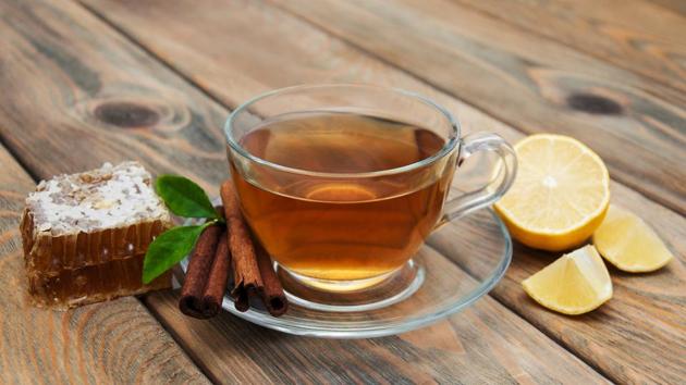 Cinnamon and honey: This is made by mixing a spoonful of honey and half a tablespoon of cinnamon in a glass of warm water. A dash of fresh lime can help in the fat burning process. Cinnamon is known to curb cravings while honey aids metabolism. (Shutterstock) Cinnamon and honey: This is made by mixing a spoonful of honey and half a tablespoon of cinnamon in a glass of warm water. A dash of fresh lime can help in the fat burning process. Cinnamon is known to curb cravings while honey aids metabolism. (Shutterstock)