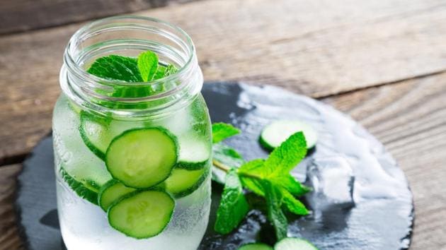 Cucumber and mint detox drink: Take a large pitcher and add a few cucumber slices along with fresh mint leaves. Let it infuse for some time and keep drinking from it the entire day. (Shutterstock) Cucumber and mint detox drink: Take a large pitcher and add a few cucumber slices along with fresh mint leaves. Let it infuse for some time and keep drinking from it the entire day. (Shutterstock)