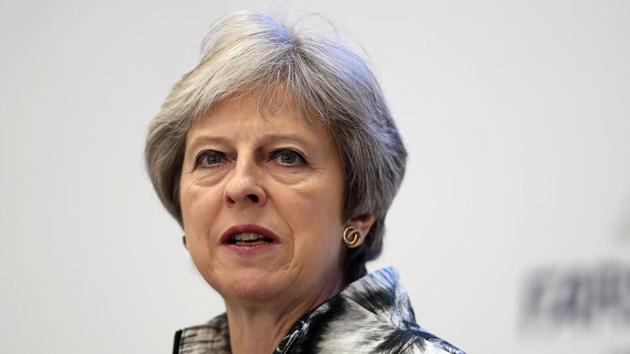 Britain's Prime Minister, Theresa May speaks at the Farnborough Airshow, in Farnborough, Britain July 16, 2018. Matt Cardy/Pool via REUTERS Images)(REUTERS)