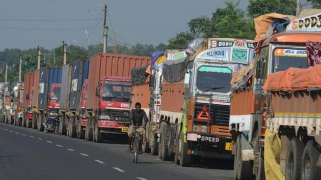 Trucks carrying goods waiting at India-Nepal border at Panitanki. (AFP File Photo) Trucks carrying goods waiting at India-Nepal border at Panitanki. (AFP File Photo)