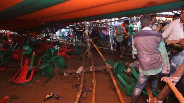 Supporters of Bhartiya Janta Party (BJP) look inside a damaged tent, which collapsed during a public meeting addressed by Prime Minister Narendra Modi (unpictured), at a college ground in Midnapore on July 16, 2018. (AFP Photo) Supporters of Bhartiya Janta Party (BJP) look inside a damaged tent, which collapsed during a public meeting addressed by Prime Minister Narendra Modi (unpictured), at a college ground in Midnapore on July 16, 2018. (AFP Photo)