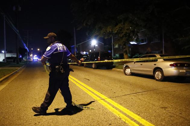 A police officer pulls crime scene tape. (AP File Photo/Representative image) A police officer pulls crime scene tape. (AP File Photo/Representative image)