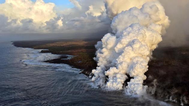Laze plumes rising where lava pours into the sea on the south margin of the fissure 8 flow of the Kilauea volcano in Hawaii. (AFP Photo) Laze plumes rising where lava pours into the sea on the south margin of the fissure 8 flow of the Kilauea volcano in Hawaii. (AFP Photo)