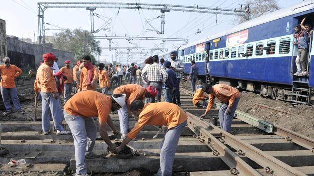 Workers repairing the railway tracks in Ludhiana.(HT File Photo)
