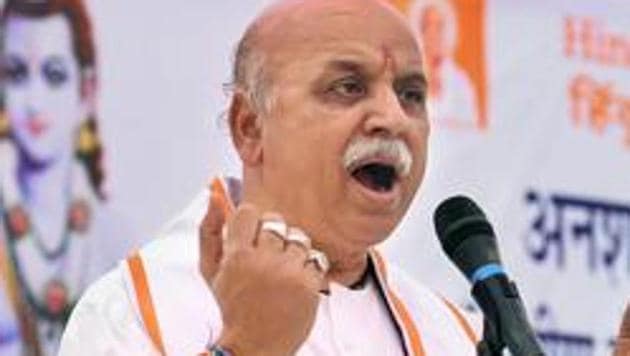 Former VHP leader Pravin Togadia addresses during his indefinite fast outside the state VHP headquarters at the Paldi in Ahmedabad. (PTI File Photo) Former VHP leader Pravin Togadia addresses during his indefinite fast outside the state VHP headquarters at the Paldi in Ahmedabad. (PTI File Photo)