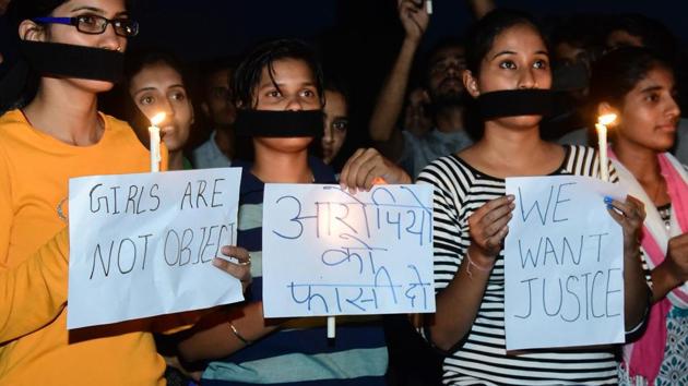 A candle light protest in Bikaner against the rape of an eight-year-old girl in MP’s Mandsaur, at Bikaner on June 30,2018.(PTI File Photo)