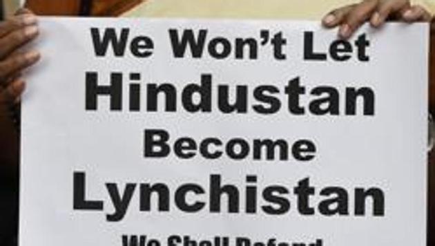 Members of All India Students Association (AISA) hold placards as they protest against the mob lynchings in the country, at Parliament street, in New Delhi, India. (HT File Photo) Members of All India Students Association (AISA) hold placards as they protest against the mob lynchings in the country, at Parliament street, in New Delhi, India. (HT File Photo)