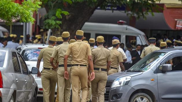 Police personnel outside Mahila court as the 17 people accused in connection with the alleged sexual assault of a 11-year-old girl were produced at Madras high court, in Chennai on July 17.(PTI Photo)