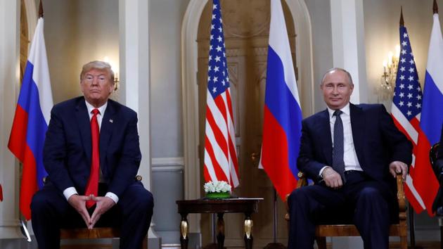 U.S. President Donald Trump meets with Russian President Vladimir Putin in Helsinki, Finland, July 16, 2018. REUTERS/Kevin Lamarque(REUTERS)
