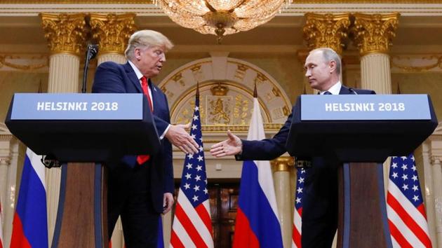 U.S. President Donald Trump and Russia's President Vladimir Putin shake hands during a joint news conference after their meeting in Helsinki, Finland, July 16, 2018. (REUTERS) U.S. President Donald Trump and Russia's President Vladimir Putin shake hands during a joint news conference after their meeting in Helsinki, Finland, July 16, 2018. (REUTERS)