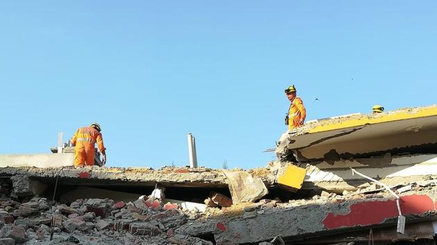 Rescue operations are on after two buildings collapsed in Greater Noida’s Shahberi village on Tuesday night. (Sunil Ghosh/HT Photo) Rescue operations are on after two buildings collapsed in Greater Noida’s Shahberi village on Tuesday night. (Sunil Ghosh/HT Photo)