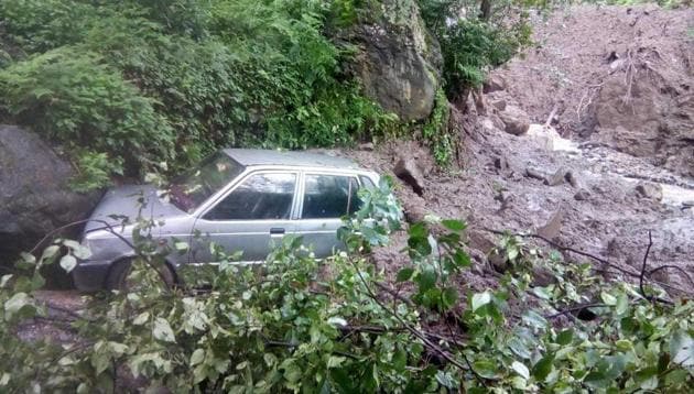 Seven vehicles including six cars and a motorbike was washed away in the flood.(HT Photo)