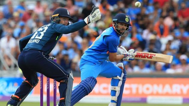 England's Jos Buttler (L) fails to make a catch from India's captain Virat Kohli during the third One Day International (ODI) cricket match between England and India, at Headingley Stadium in Leeds, northern England on July 17, 2018.(AFP)