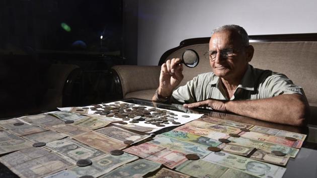 D.C.Ahuja shows antique coins and currency collection at his residence in Gurugram. Ahuja has been collecting coins since his childhood and became an ardent collector in 2013, after attending a coins and notes exhibition in New Delhi. The oldest coin he has is the ‘quarter anna’ of 1835, minted by the East India Company. (Sanjeev Verma / HT Photo) D.C.Ahuja shows antique coins and currency collection at his residence in Gurugram. Ahuja has been collecting coins since his childhood and became an ardent collector in 2013, after attending a coins and notes exhibition in New Delhi. The oldest coin he has is the ‘quarter anna’ of 1835, minted by the East India Company. (Sanjeev Verma / HT Photo)