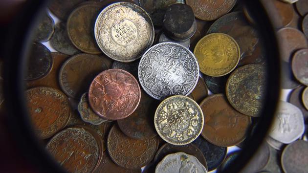 Among Ahuja’s collection are several pre-independence coins, including the quarter rupee coin of 1884 and the one rupee coin of 1890. He also has a collection of foreign currency and has notes and coins from 120 countries. (Sanjeev Verma / HT Photo) Among Ahuja’s collection are several pre-independence coins, including the quarter rupee coin of 1884 and the one rupee coin of 1890. He also has a collection of foreign currency and has notes and coins from 120 countries. (Sanjeev Verma / HT Photo)