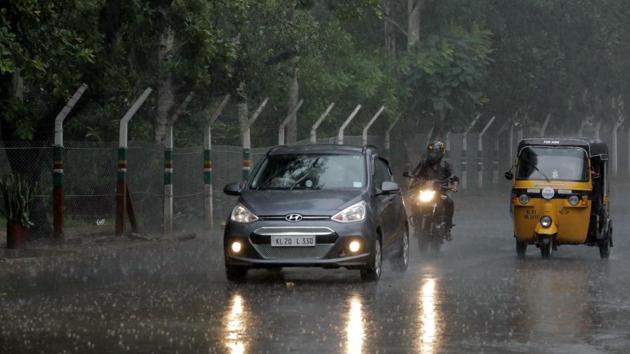 People commute by various modes of transport as it rains in Thiruvananthapuram, Kerala on Monday, May 28, 2018. (HT File Photo) People commute by various modes of transport as it rains in Thiruvananthapuram, Kerala on Monday, May 28, 2018. (HT File Photo)