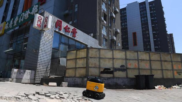 But Zhen Robotics is convinced the costs will come down. Liu said that the robot will soon be equipped with the necessary technology to operate a lift, no longer confined to ground-floor deliveries. Deliveries in China are increasingly being made by autonomous means. In recent months, several firms have received the green light to operate drones, either to deliver directly to customers or ferry goods between hubs. (Greg Baker / AFP) But Zhen Robotics is convinced the costs will come down. Liu said that the robot will soon be equipped with the necessary technology to operate a lift, no longer confined to ground-floor deliveries. Deliveries in China are increasingly being made by autonomous means. In recent months, several firms have received the green light to operate drones, either to deliver directly to customers or ferry goods between hubs. (Greg Baker / AFP)