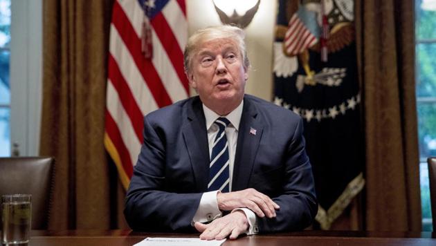 US President Donald Trump speaks to mediapersons as he meets with members of the Congress in the cabinet room of the White House on Tuesday. (AP Photo) US President Donald Trump speaks to mediapersons as he meets with members of the Congress in the cabinet room of the White House on Tuesday. (AP Photo)