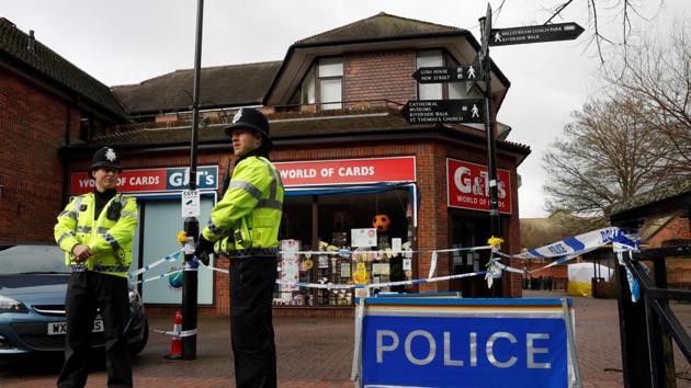 Police officers at The Maltings shopping centre in Salisbury where Ex-Russian spy Sergei Skripal and his daughter Yulia were found critically ill on March 4, after being apparently poisoned with Novichok.(AFP Photo)