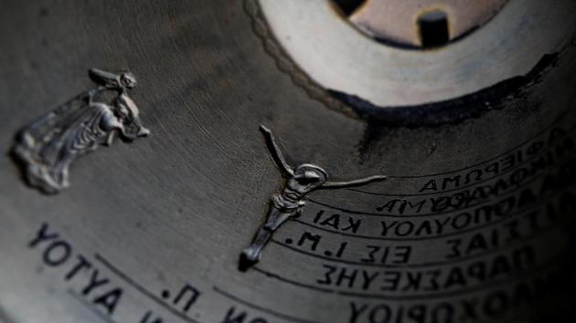 An engraving of crucified Jesus Christ is seen inside a bell mould at the Galanopoulos bell foundry. At its peak, the foundry was producing 120 tonnes of bells a year for steeples across Greece, Thomas said. Now, it’s down to 50 tonnes and their main customers are churches in the Balkans and Africa, while they also ship to Israel, Lebanon and Australia. (REUTERS)