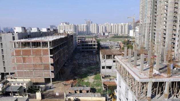 Illegal buildings around the two collapsed structures at Shahberi village in Greater Noida on Wednesday, July 18, 2018.(Sunil Ghosh / HT Photo)