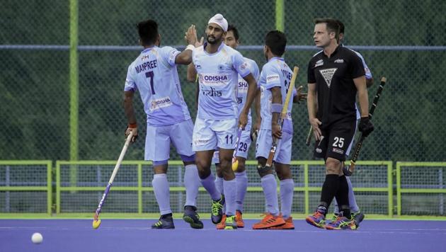 Indian men’s hockey team players celebrate their win over New Zealand in Bengaluru on Thursday.(PTI)