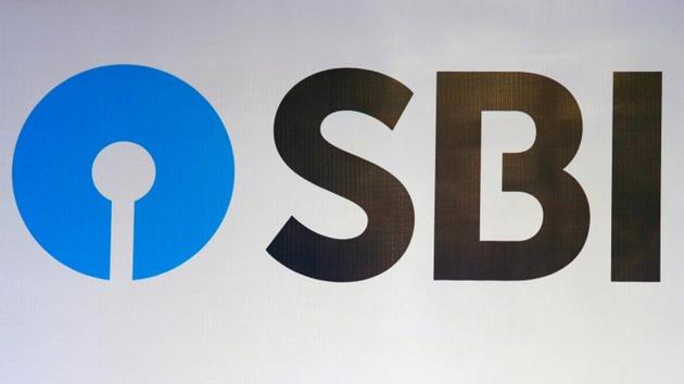 The new logo of State Bank of India (SBI) is pictured at the podium of the venue of a news conference after the announcement of SBI's fourth quarter results, in Kolkata, India May 19, 2017. REUTERS/Rupak De Chowdhuri/File Photo (Reuters File Photo) The new logo of State Bank of India (SBI) is pictured at the podium of the venue of a news conference after the announcement of SBI's fourth quarter results, in Kolkata, India May 19, 2017. REUTERS/Rupak De Chowdhuri/File Photo (Reuters File Photo)