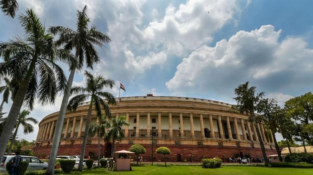Clouds hover over Parliament House on the first day of the Monsoon Session of Parliament, in New Delhi on Wednesday. (PTI Photo) Clouds hover over Parliament House on the first day of the Monsoon Session of Parliament, in New Delhi on Wednesday. (PTI Photo)