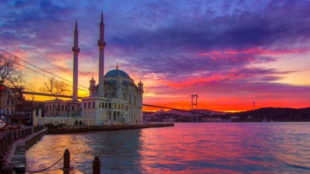 Sunset at Ortakoy Mosque and Bosphorus Bridge, in Istanbul, Turkey.  (shutterstock) 