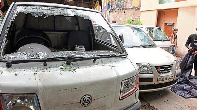 A vehicle that was damaged during Thursday night’s violence in Trilokpuri. (Sonu Mehta/HT PHOTO) A vehicle that was damaged during Thursday night’s violence in Trilokpuri. (Sonu Mehta/HT PHOTO)