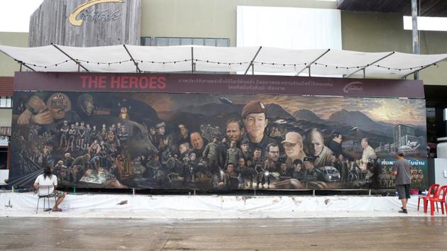Artists paint as they work on The Heroes giant painting project, in Art Bride gallery, Chiang Rai, Thailand. (REUTERS) Artists paint as they work on The Heroes giant painting project, in Art Bride gallery, Chiang Rai, Thailand. (REUTERS)