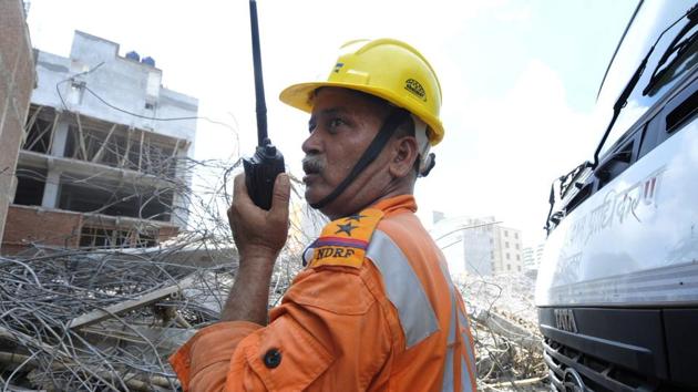 National Disaster Response Force (NDRF) team continue their rescue operation as they search the debris on the third day of building collapse at Shahberi village in Greater Noida on Thursday. (Sunil Ghosh / HT Photo) National Disaster Response Force (NDRF) team continue their rescue operation as they search the debris on the third day of building collapse at Shahberi village in Greater Noida on Thursday. (Sunil Ghosh / HT Photo)
