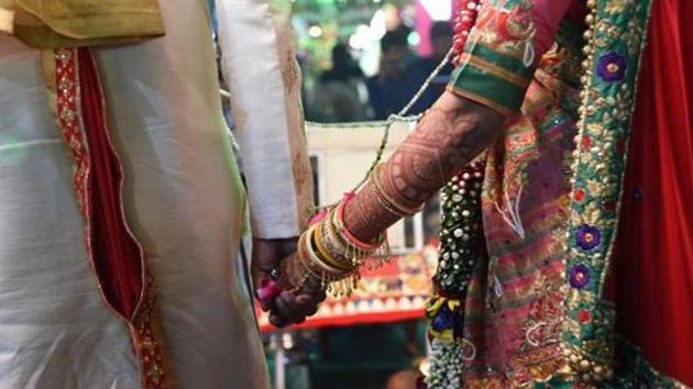 Women and child development minister Maneka Gandhi had on Wednesday urged states to get their marriage registrars inform the ministry about registration of such marriages immediately.(AFP File Photo)