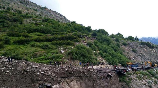 Four people, including two kids, were inside a hut that collapsed due to a landslide triggered by a cloudburst in Chamoli district on Friday.(Photo credit: SDRF)