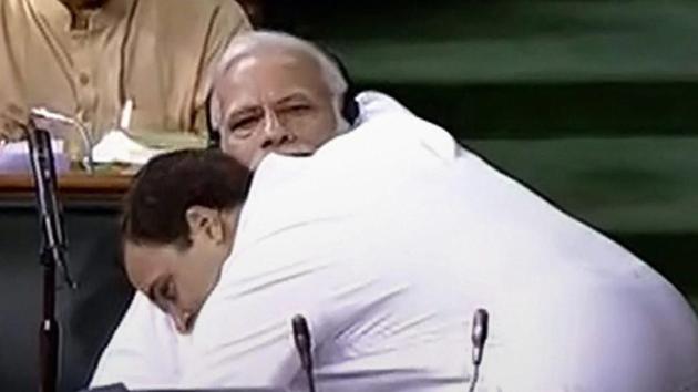 Rahul Gandhi made an aggressive attack on the BJP-led central government during a debate on a no-confidence motion in the Lok Sabha today, peppering his hour-long speech with constant barbs at Prime Minister Narendra Modi, who, he alleged, “cannot look me in the eye.” Gandhi after ending his speech walked over to the Prime Minister and hugged him. (LSTV Grab / PTI) Rahul Gandhi made an aggressive attack on the BJP-led central government during a debate on a no-confidence motion in the Lok Sabha today, peppering his hour-long speech with constant barbs at Prime Minister Narendra Modi, who, he alleged, “cannot look me in the eye.” Gandhi after ending his speech walked over to the Prime Minister and hugged him. (LSTV Grab / PTI)
