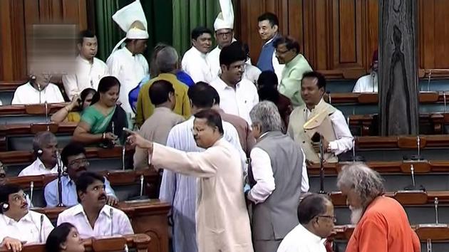Biju Janata Dal (BJD) members walk out of the Lok Sabha during a debate on 'no-confidence motion' in the Monsoon Session of Parliament, in New Delhi on July 20. (PTI Photo) Biju Janata Dal (BJD) members walk out of the Lok Sabha during a debate on 'no-confidence motion' in the Monsoon Session of Parliament, in New Delhi on July 20. (PTI Photo)
